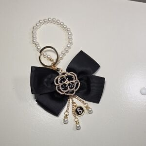 Elegant Black Bow Keychain with Pearl Accents